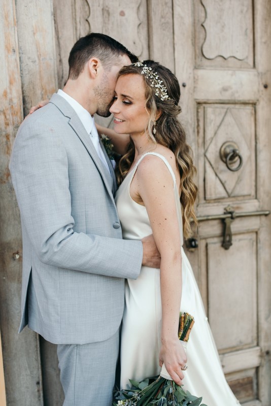Seaside Romance Wedding Couple Embrace at Telegraph Cove on Vancouver Island