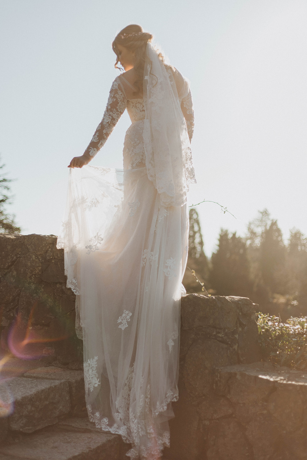 Bride with lace gown and train by Blush Victoria