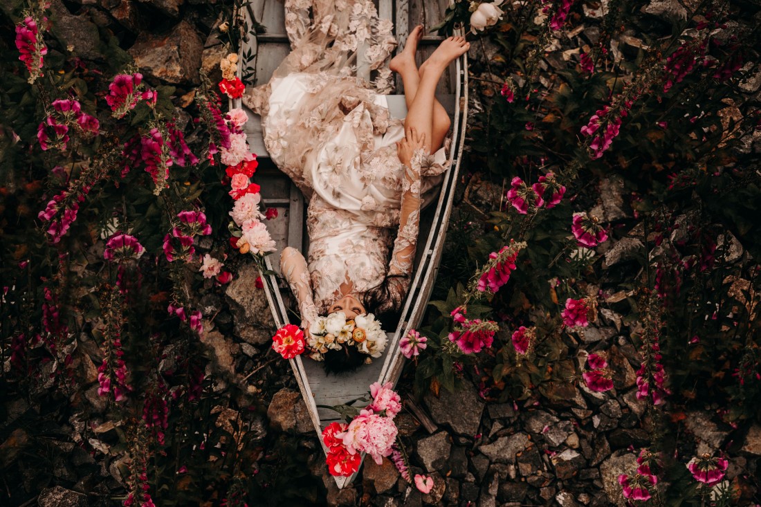 Foxgloves are Forever Island Moments Photography Bride laying in boat