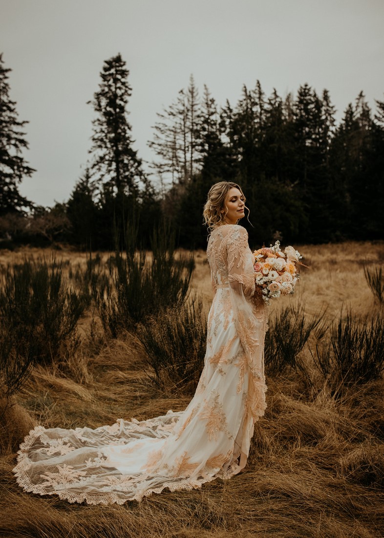 Romantic Cover for Vancouver Island Magazine Secret Waters Photography bride poses with side view of gown