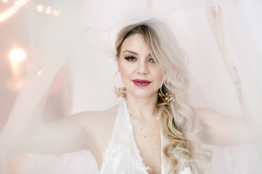 Love Letters at Dolphin's Resort bride under veil by Erin Wallis Photography
