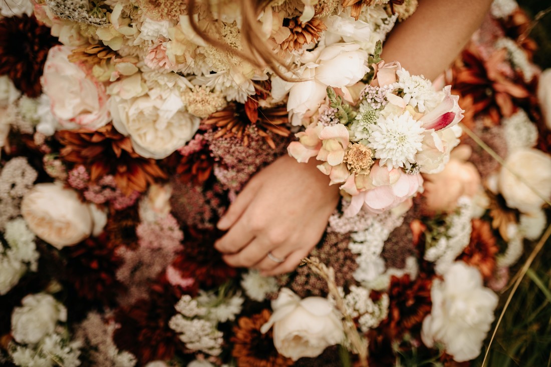 Flower bracelets on bride