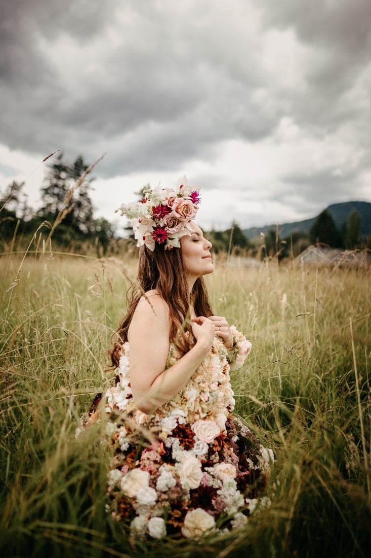 Bride dressed in flowers in Vancouver Island meadow