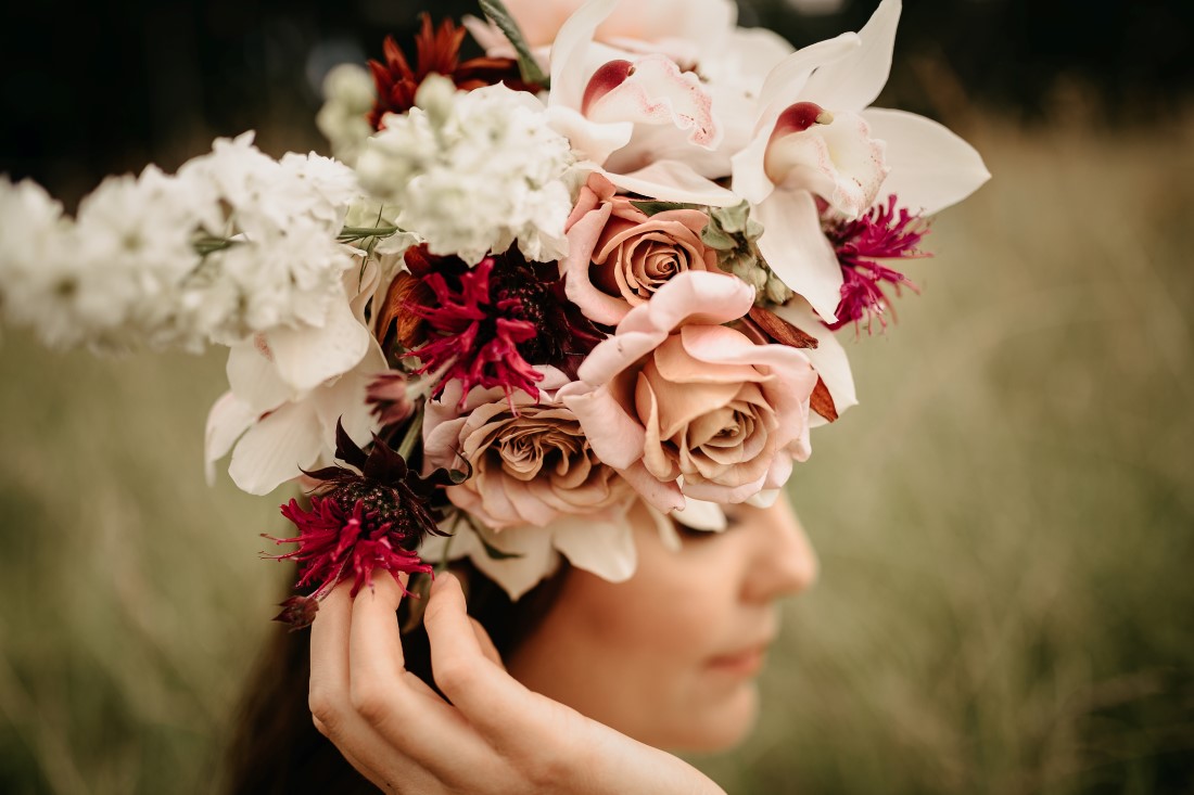 Bridal wreath of roses and orchids by Ingrid Rose Artistry