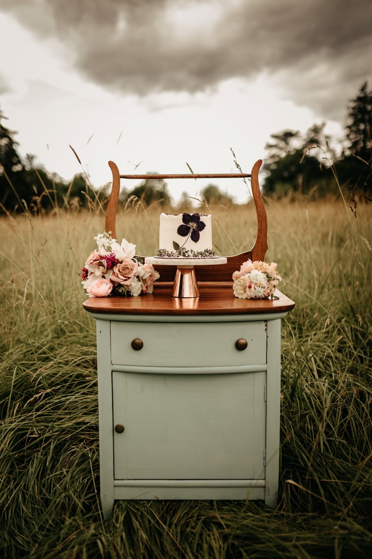 Wildflower Wedding Dessert Inspiration Field of Flowers dessert display on vintage dresser by Schur to Please