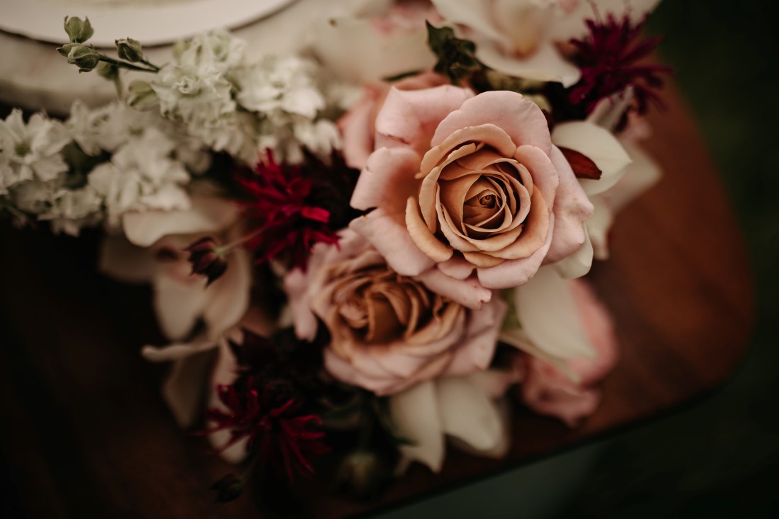 Blush roses in floral wedding gown by Karen Bezaire on Vancouver Island