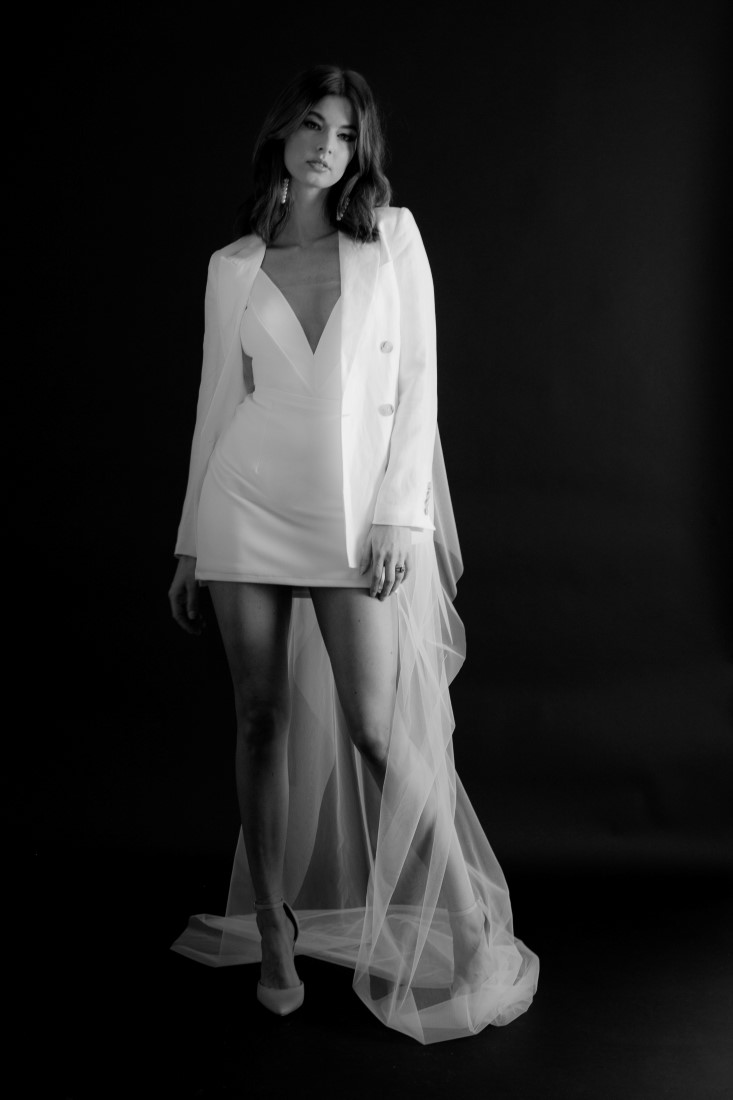 Bride in long veil and white suit jacket by Fern and Moon Vancouver