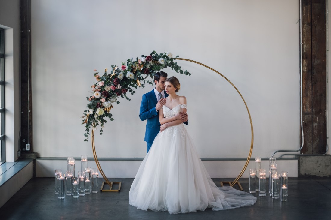 Laura Olson Photography Bride and Groom Arch Golden Hour Wedding at The Vancouver Shipyards