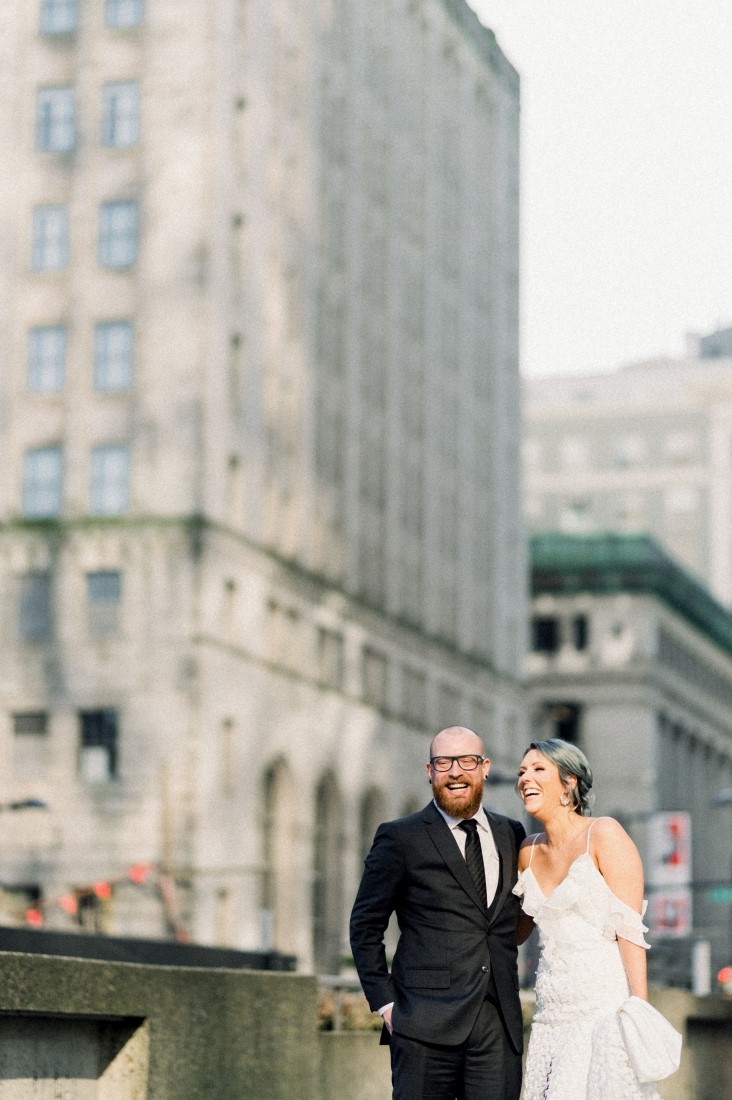 Vancouver wedding couple walk through streets of the city