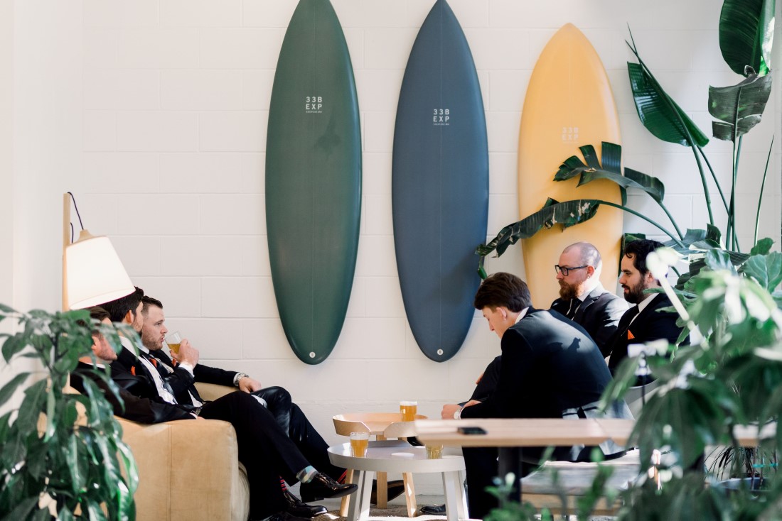 Wedding guests sit in Fiore and Famiglia Vancouver