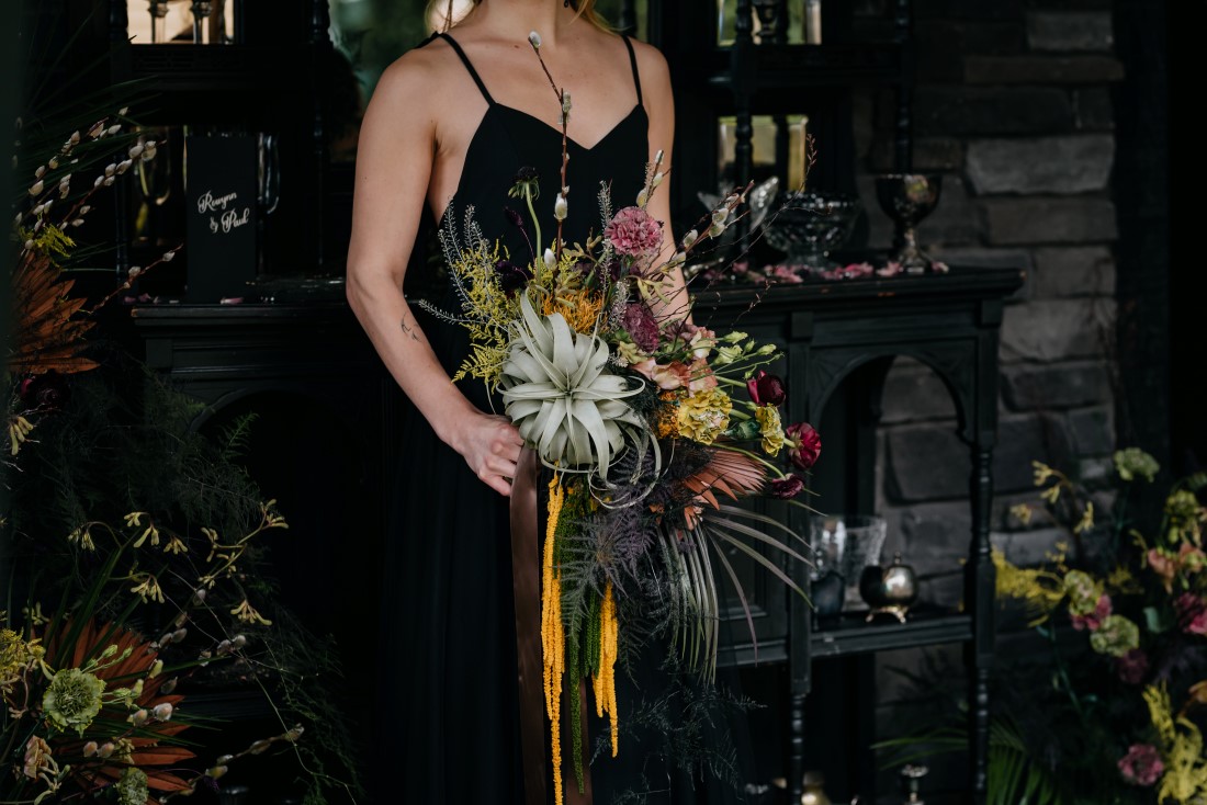 Extraordinary bridal bouquet by Wild Rabbit Flowers with gold ribbons