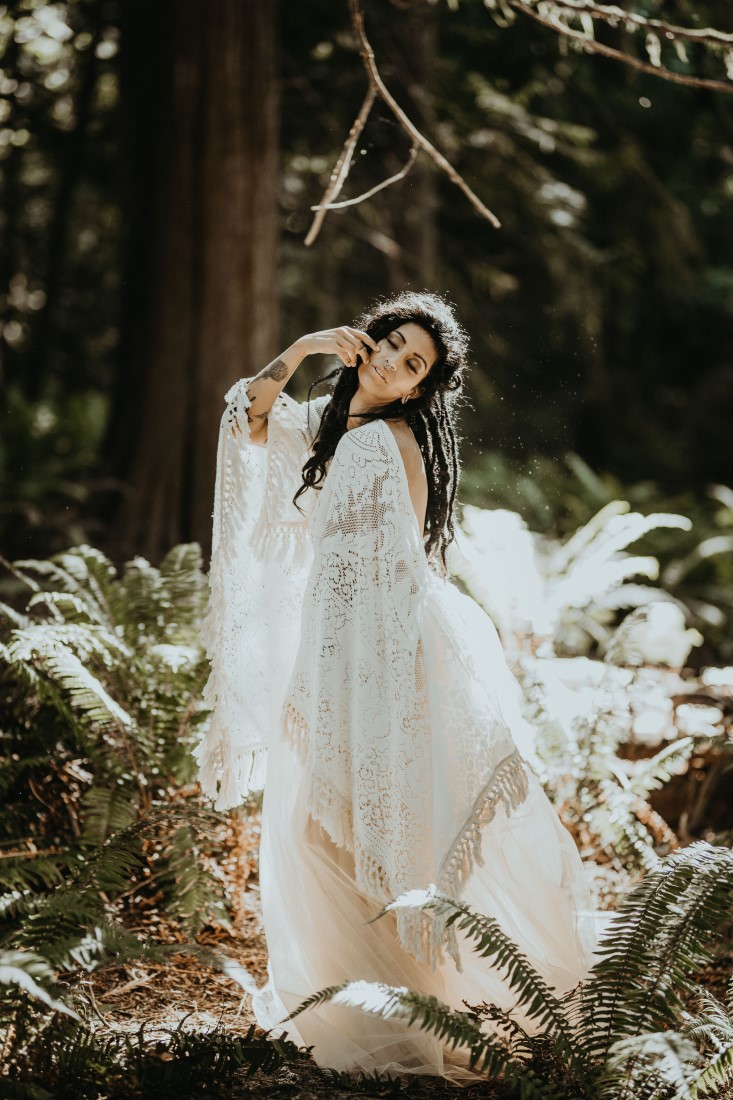Bride frolics in Vancouver Island forest by Rivkah Photography
