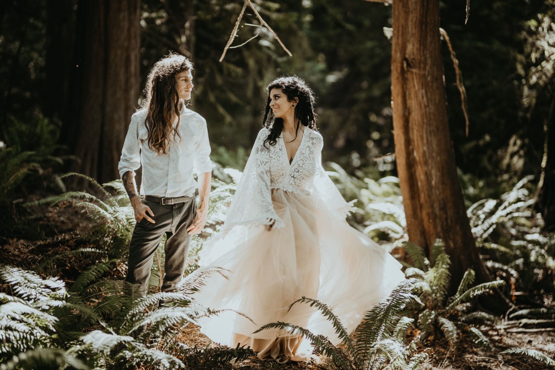 Bride and groom under the sun in Vancouver Island forest