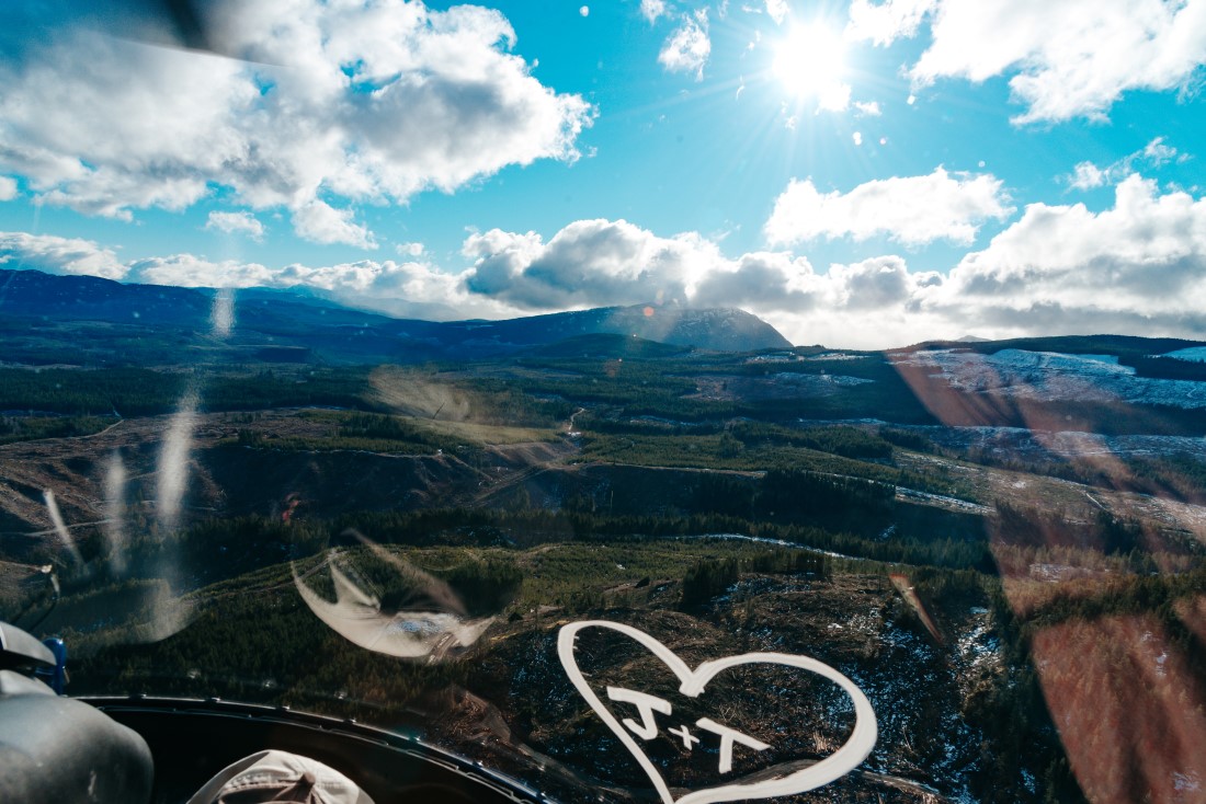 Helicopter view of couple's engagement by Janayh Wright 