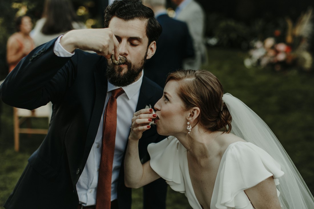 Couple drink to their wedding in Vancouver backyard