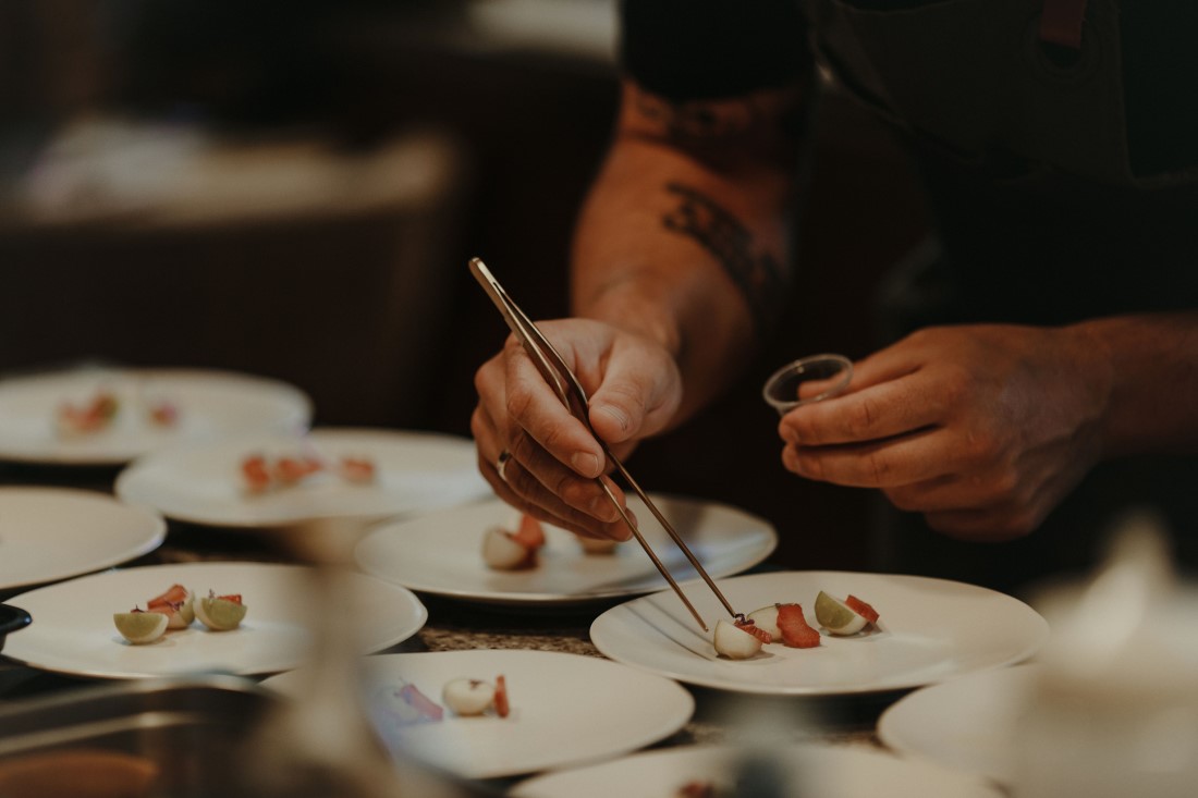 Salt and Earth Catering Co. arrange wedding plates for Vancouver guests