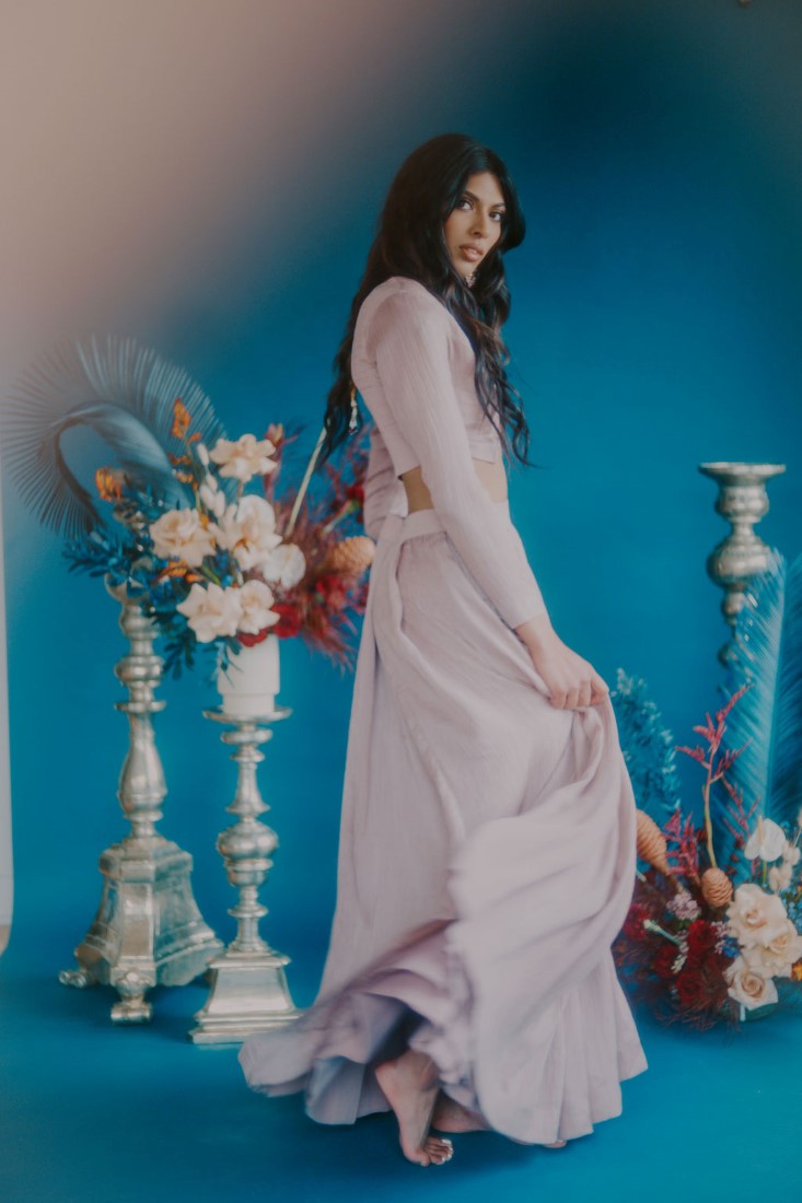 Bride swirls her lilac lehengas