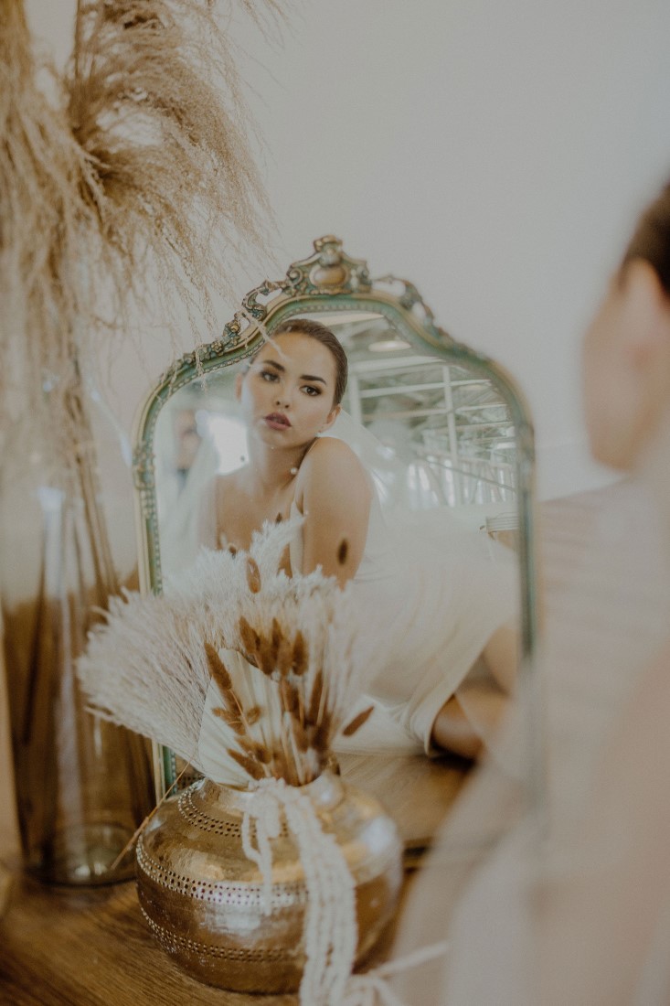 New Moon Bride Inspiration looks in mirror