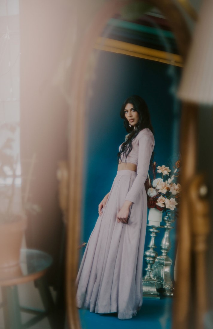 Unity of Love bride looks out window