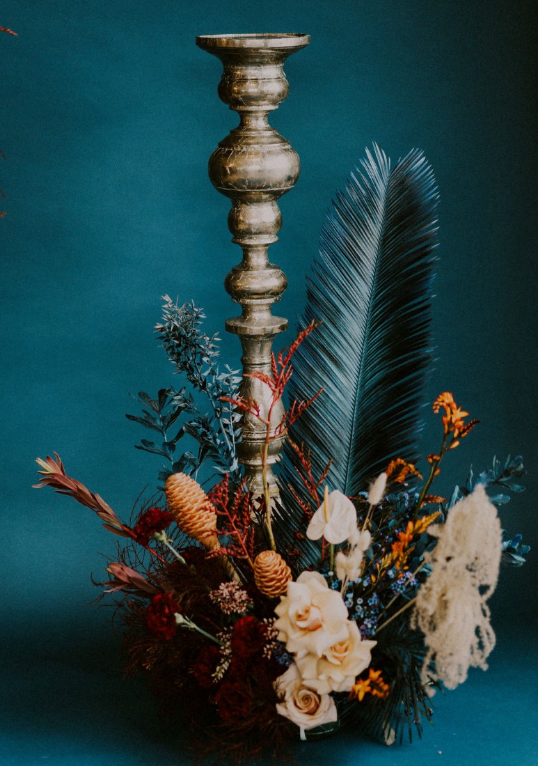 Orange and teal flower arrangement for wedding in Vancouver