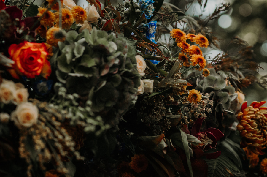 Orange and blue wedding floral design by Niche Boutique Florals of Vancouver