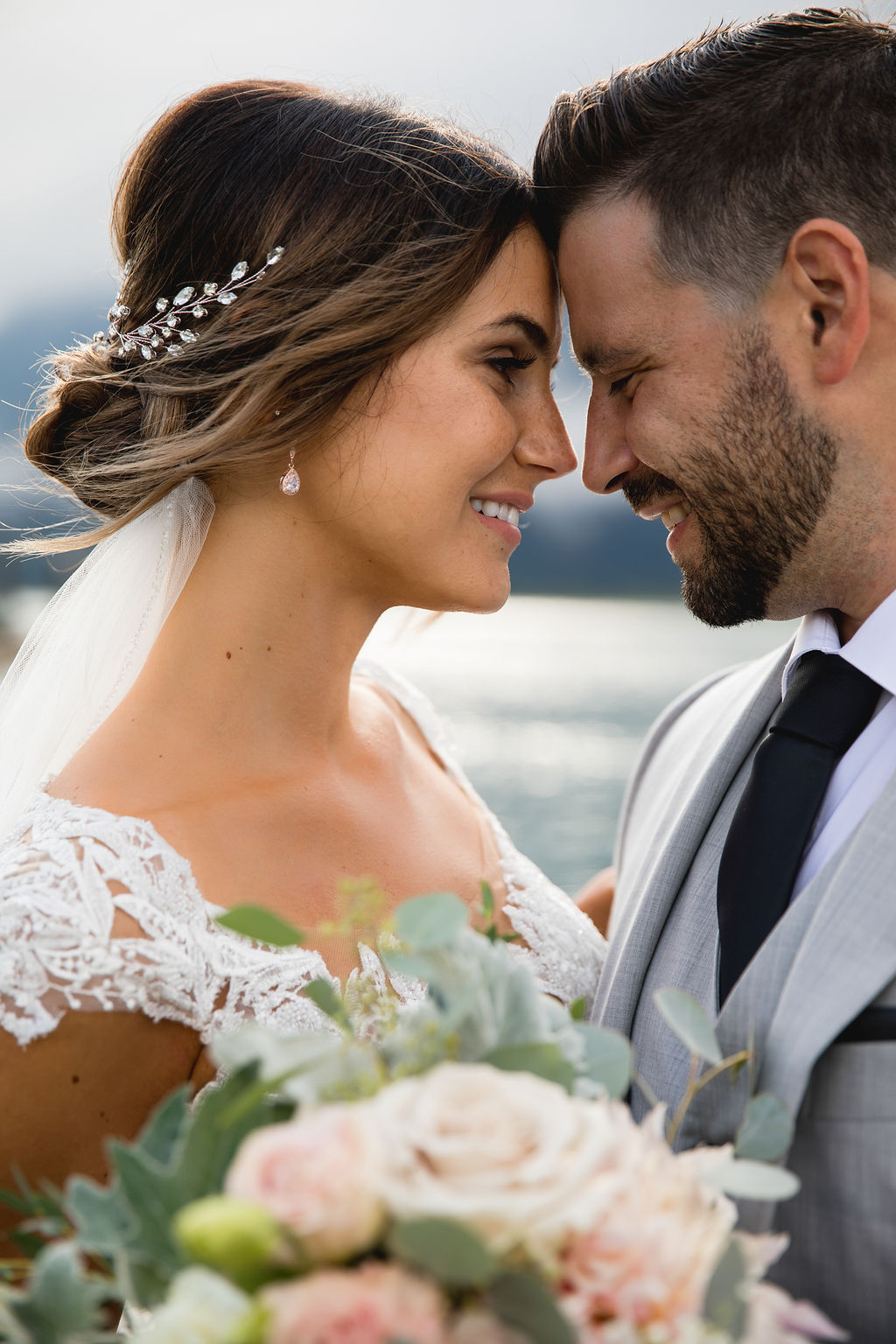 Romantic Newlyweds smile at each other