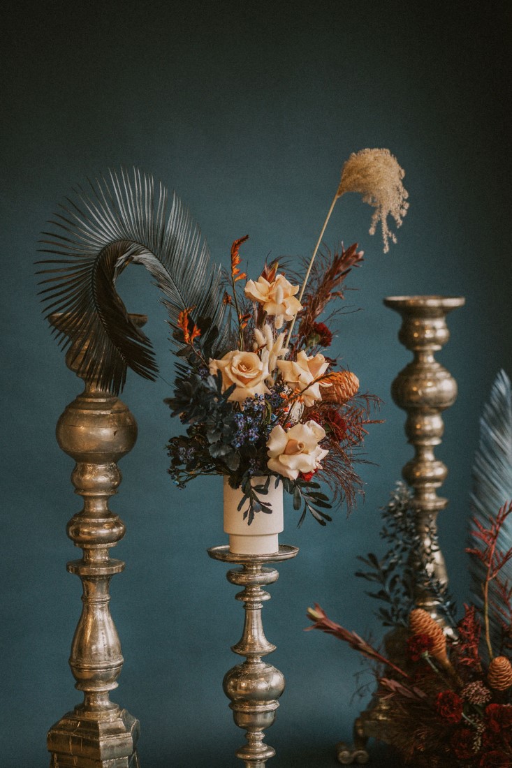 Tea and Blush floral on gold candelabras by Sarah England Photography