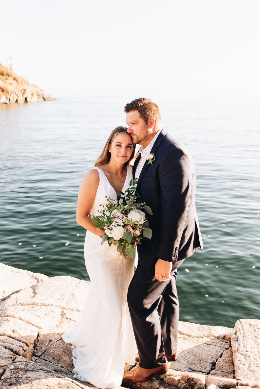 Dreamy Keats Island elopement newlyweds pose on the cliffs