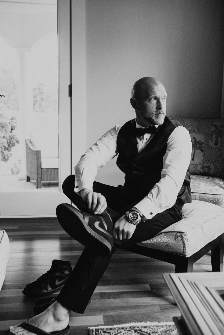 Groom getting ready before ceremony at Villa Eyrie 