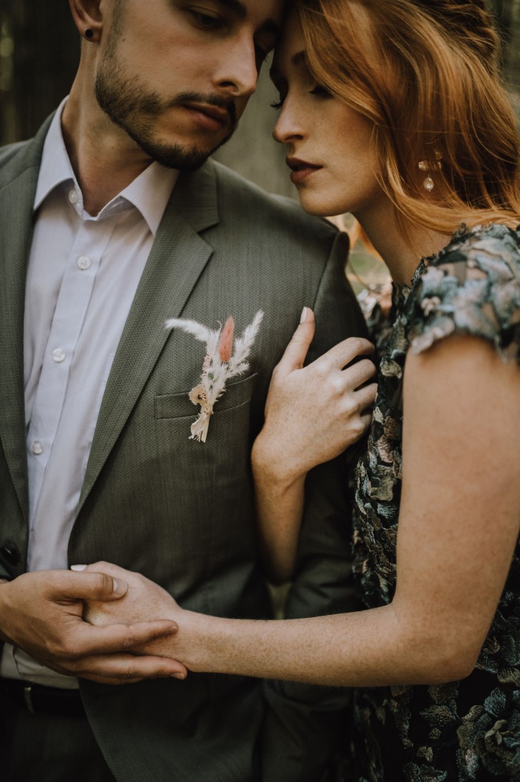 Groom wears bout of grass by You Flowers