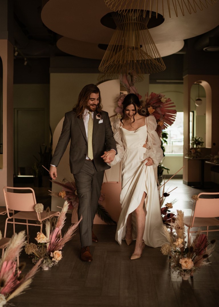 Playful and pink sweeping exit west coast wedding