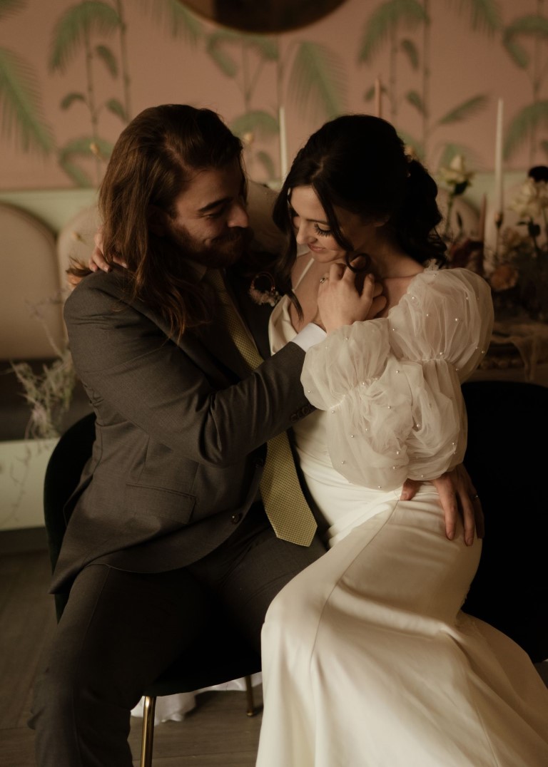 Tender moment West coast bride and groom