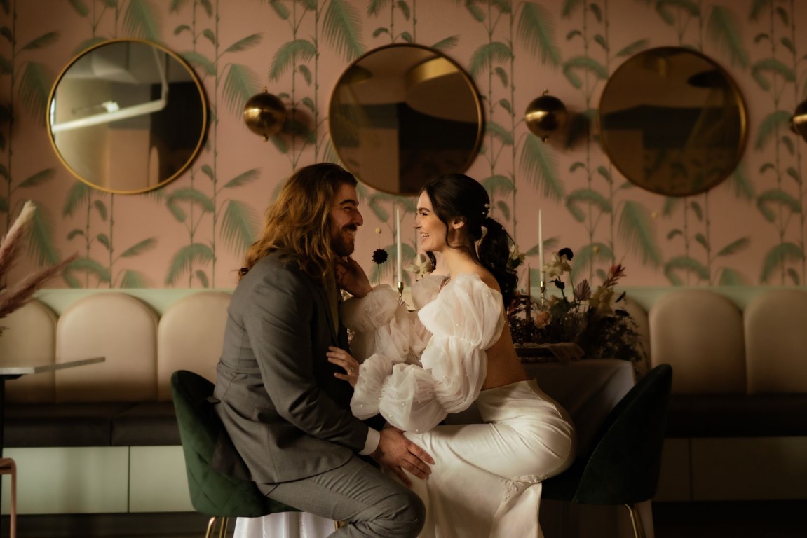 Playful Pose with pink decor at Bear and Joey Victoria wedding