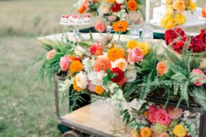 Somewhere Over The Rainbow Floral Design on Cake Table