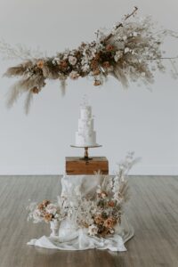 autumn palette cake and floral display