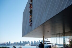 Polygon Gallery view across Vancouver ocean with large yacht