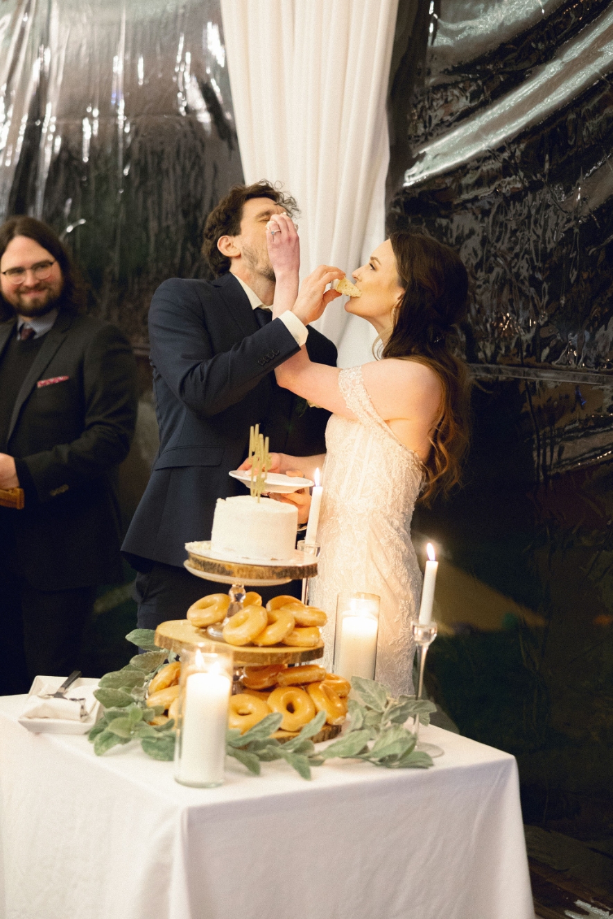 WCW_JLGRAPHY (35) bride and groom feed each other cake