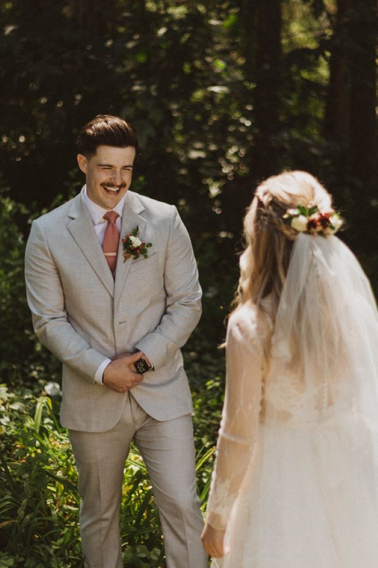 grooms first look at his beautiful bride