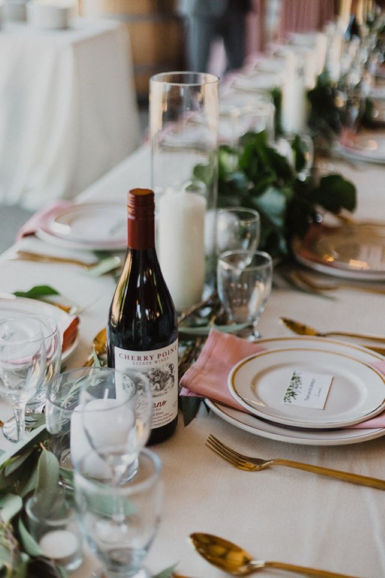 wine bottle from cherry point estate and table place settings